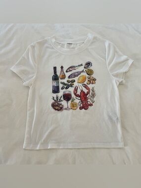 White graphic babyTee with Seafood & Wine design
